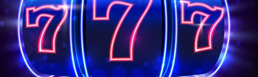 777 on slot reels in pink and blue neon lights